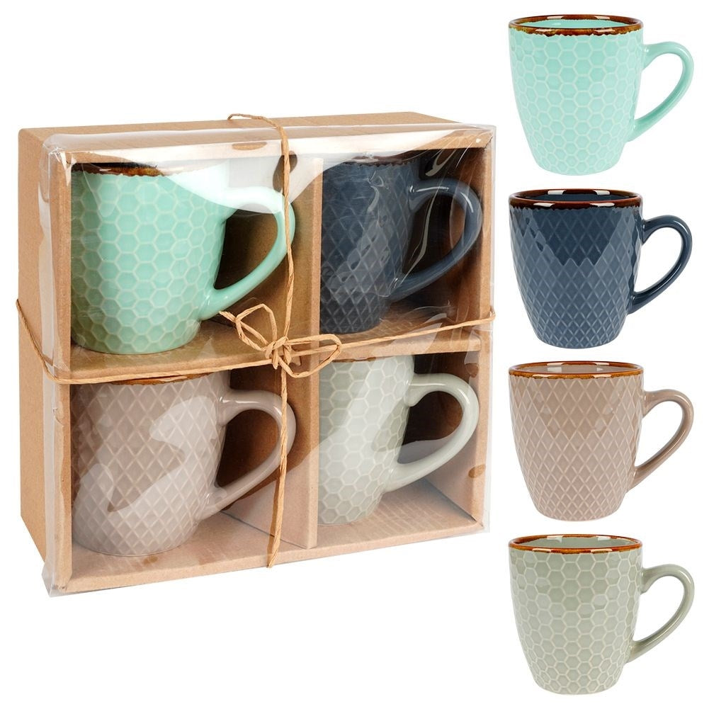 Elegant set of decorated ceramic cups in a gift box