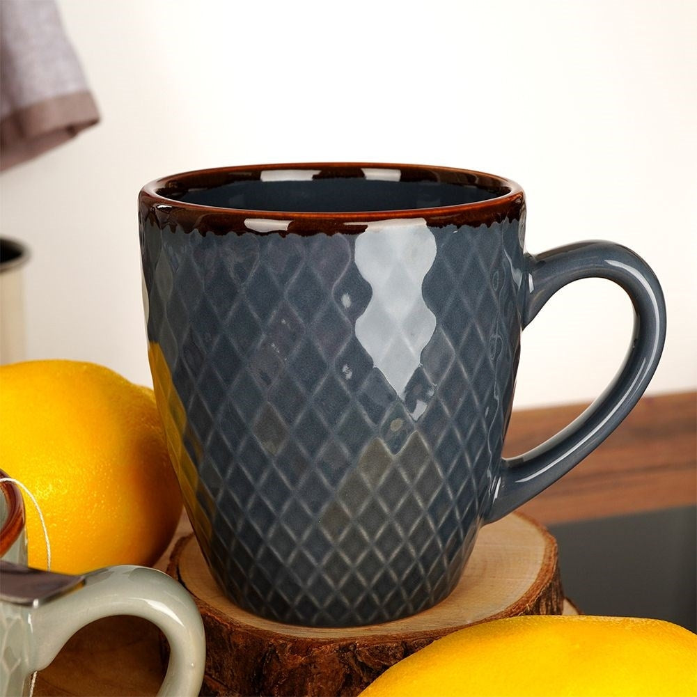 Elegant set of decorated ceramic cups in a gift box