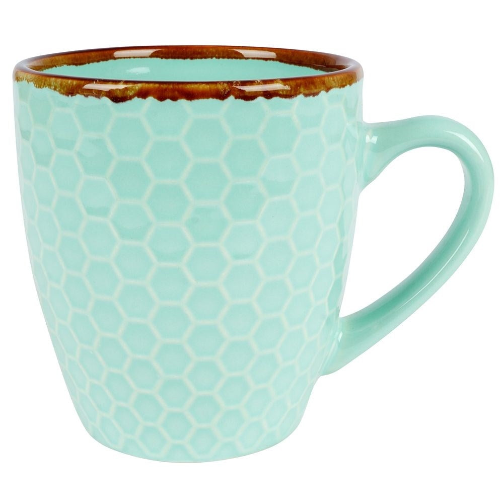 Elegant set of decorated ceramic cups in a gift box