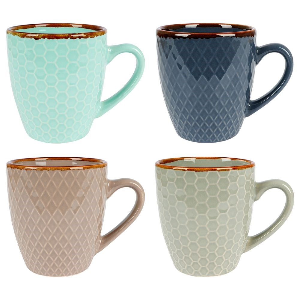 Elegant set of decorated ceramic cups in a gift box