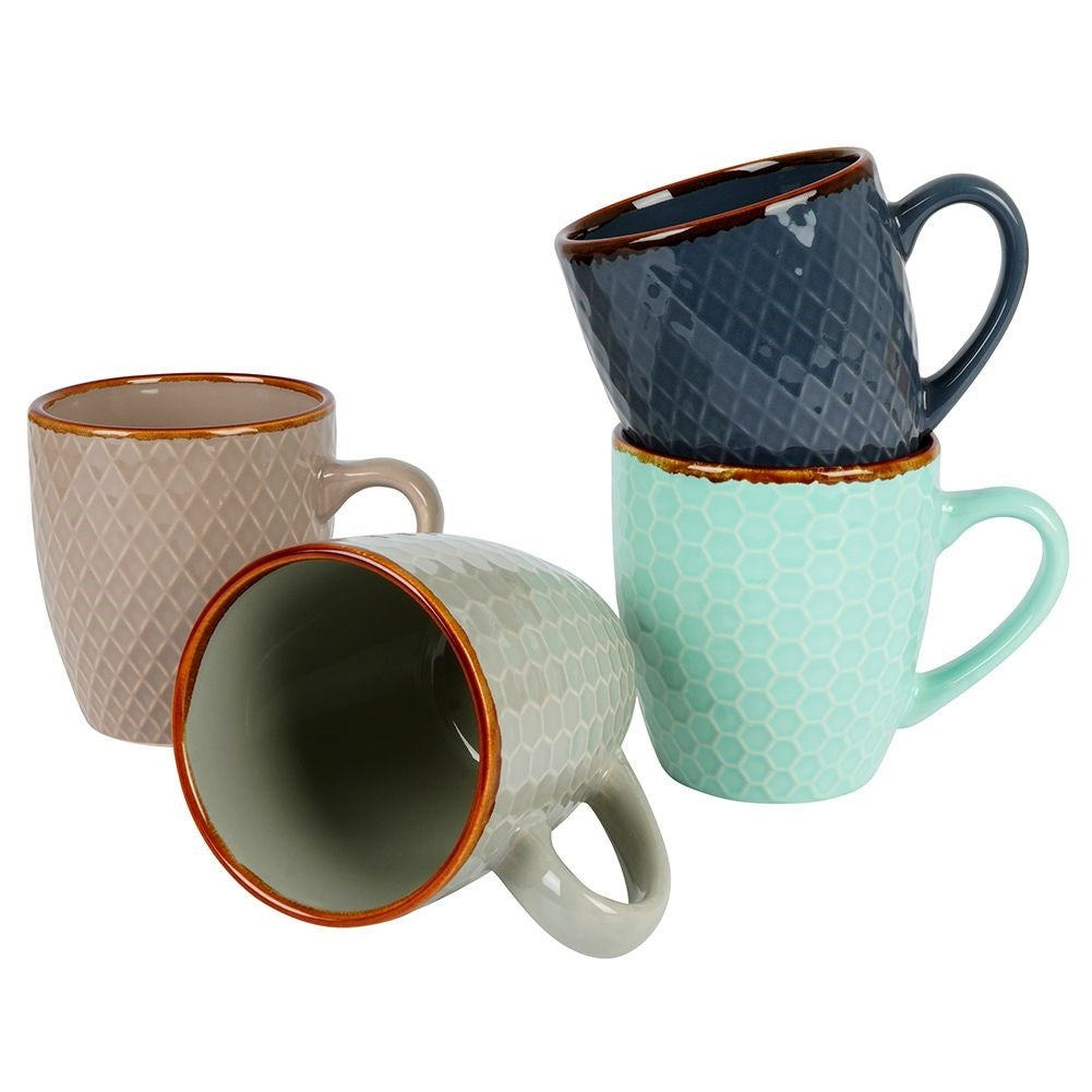 Elegant set of decorated ceramic cups in a gift box