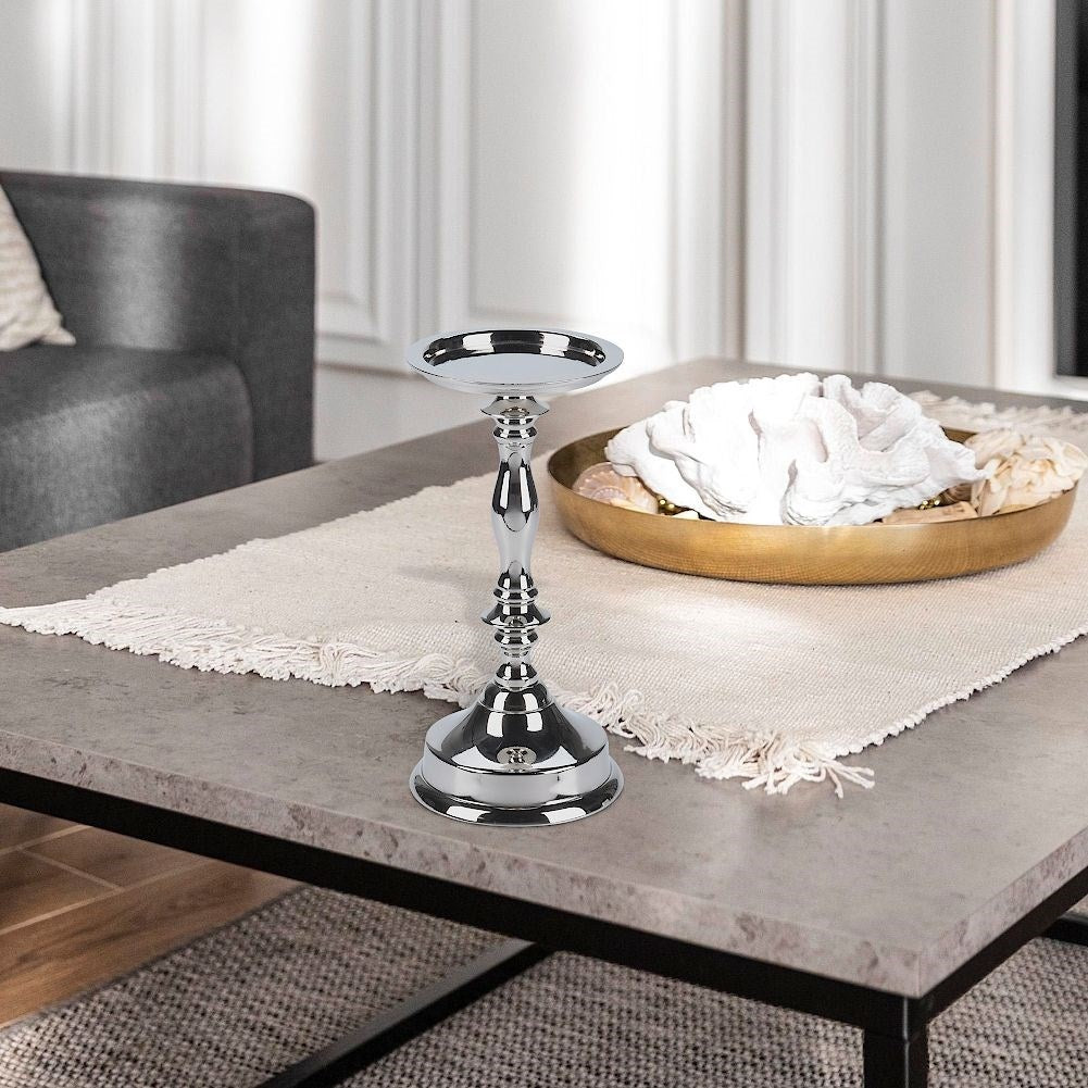 Elegant silver candle holder in classic highly polished metal