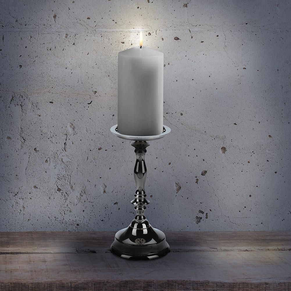 Elegant silver candle holder in classic highly polished metal