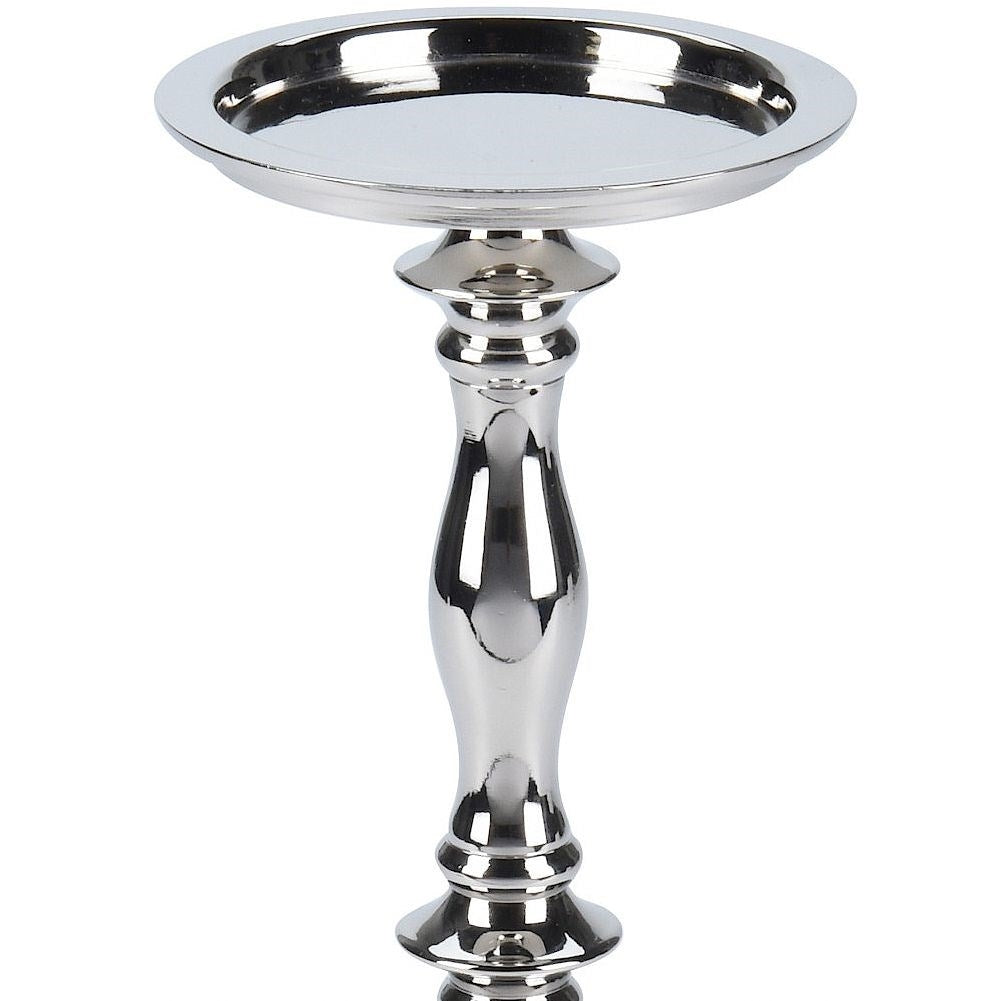 Elegant silver candle holder in classic highly polished metal
