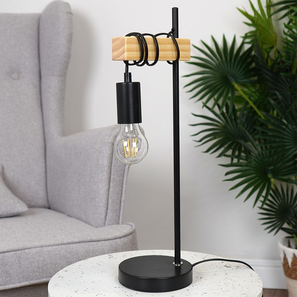Elegant table lamp in matt black metal and wood for an industrial style