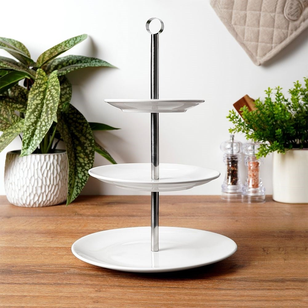 Elegant three-level serving dish in porcelain and stainless steel