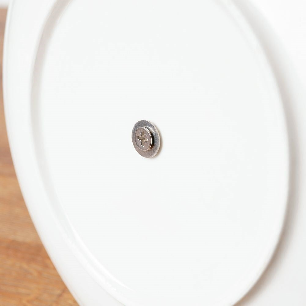 Elegant three-level serving dish in porcelain and stainless steel