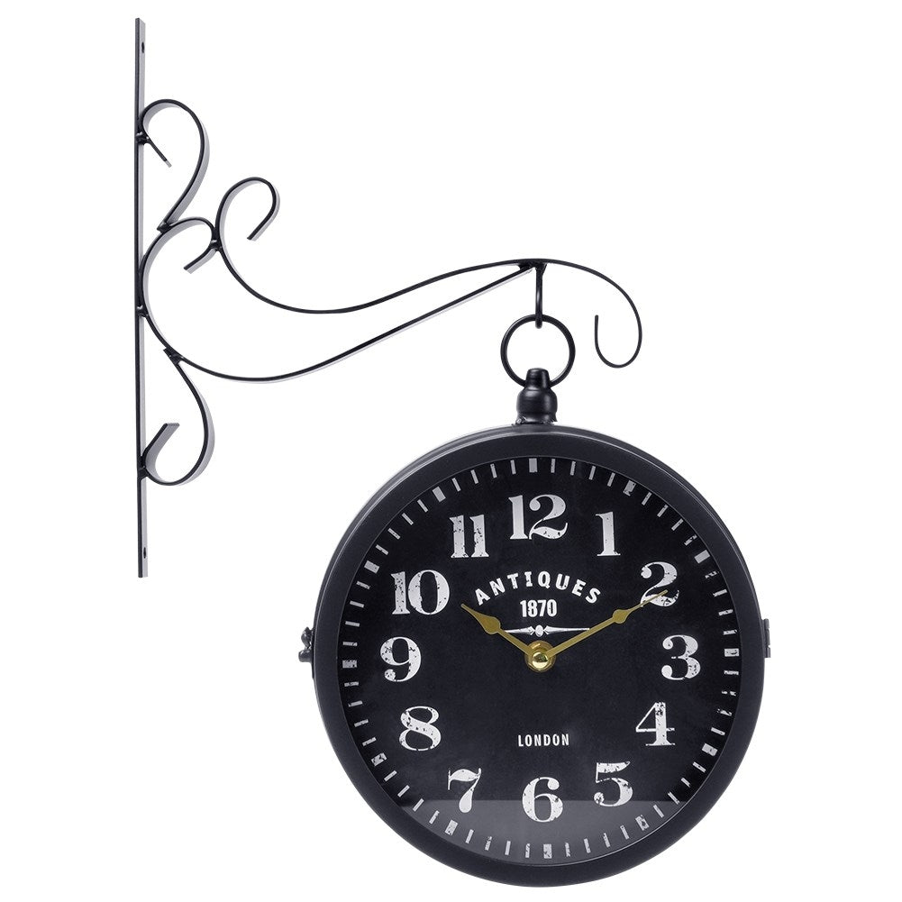 Elegant two-sided watch with a black dial and golden hands