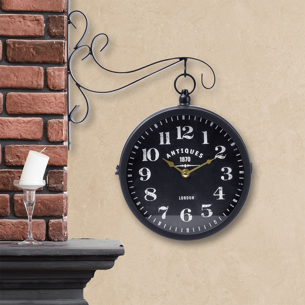 Elegant two-sided watch with a black dial and golden hands