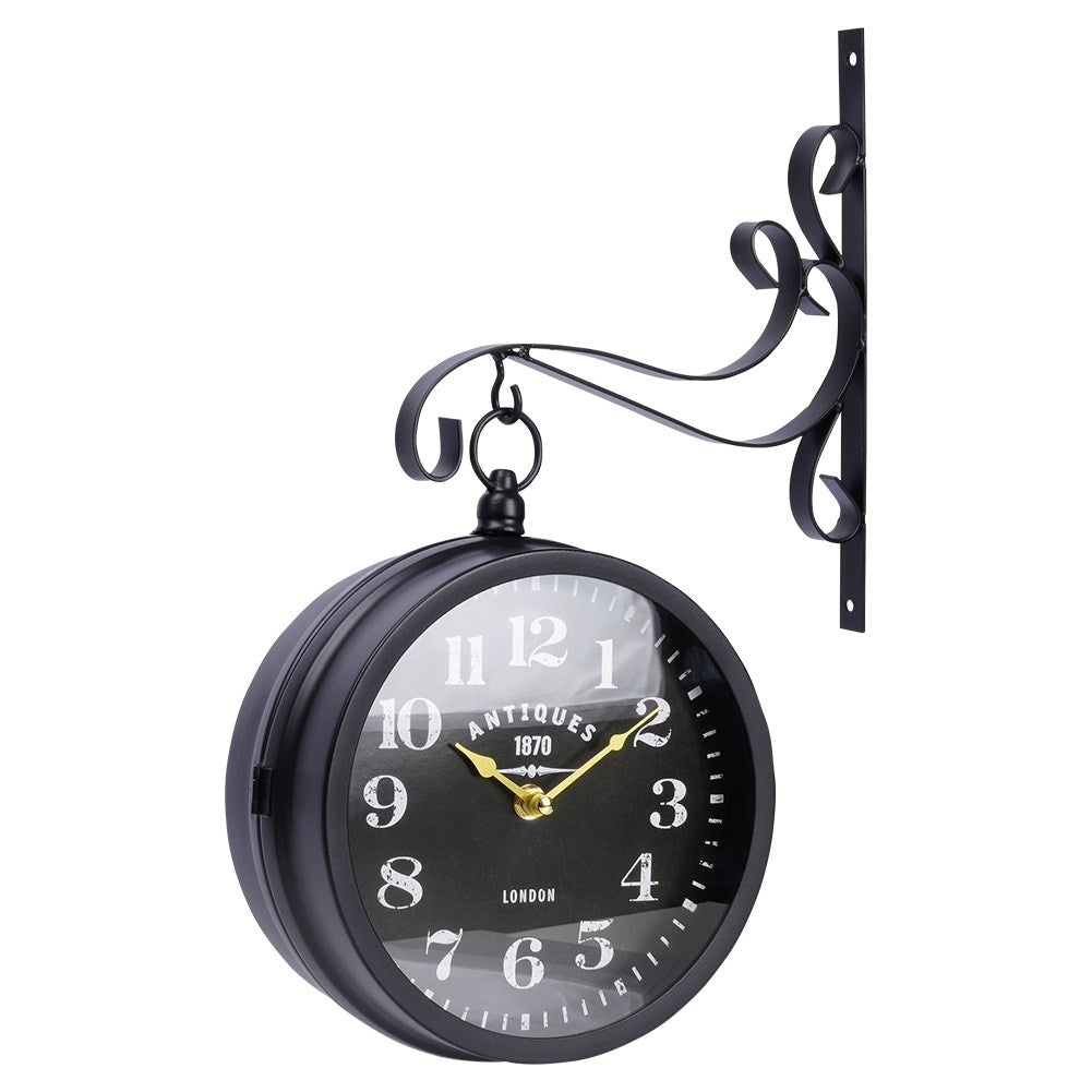 Elegant two-sided watch with a black dial and golden hands