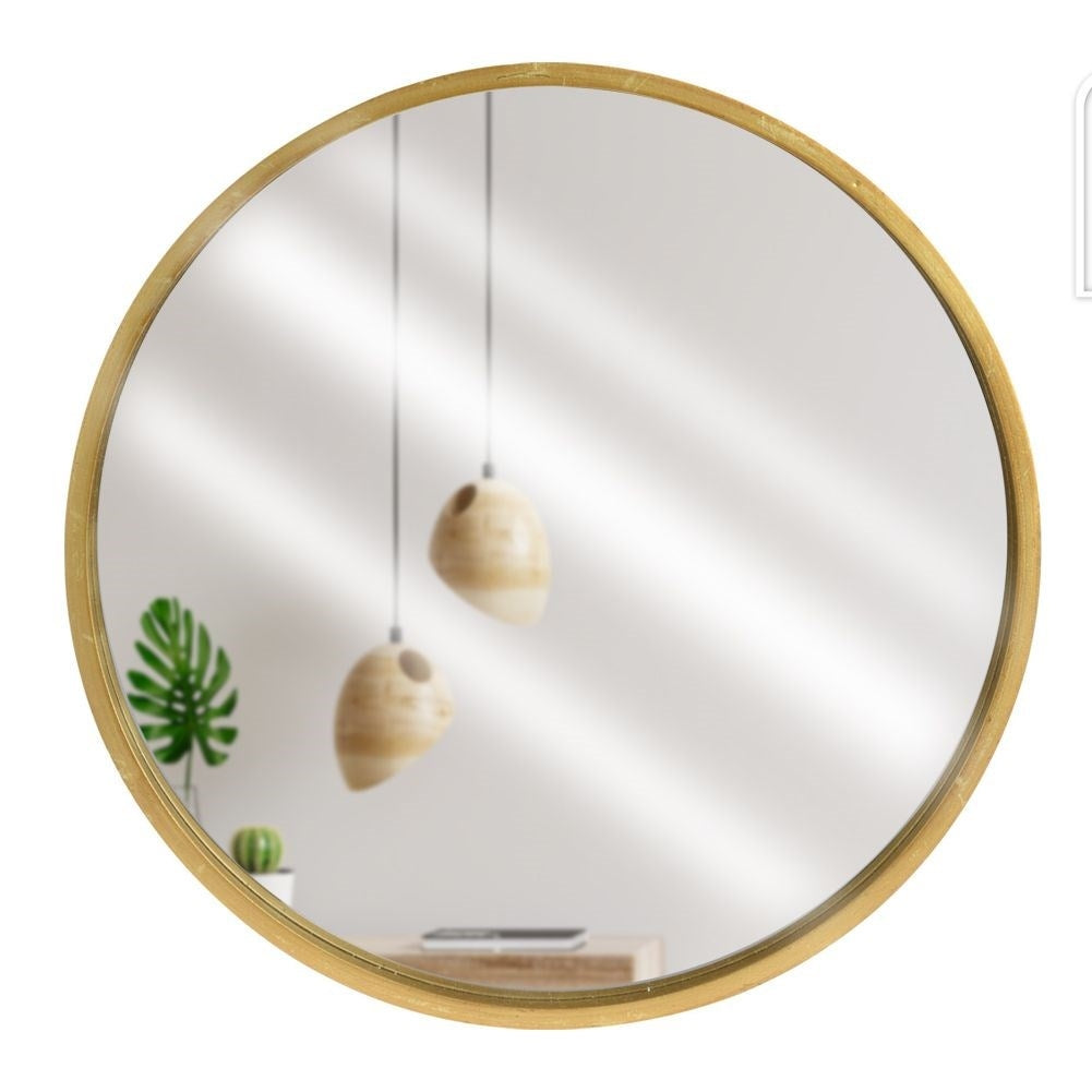 Elegant wall-hung mirror in gold wooden frame