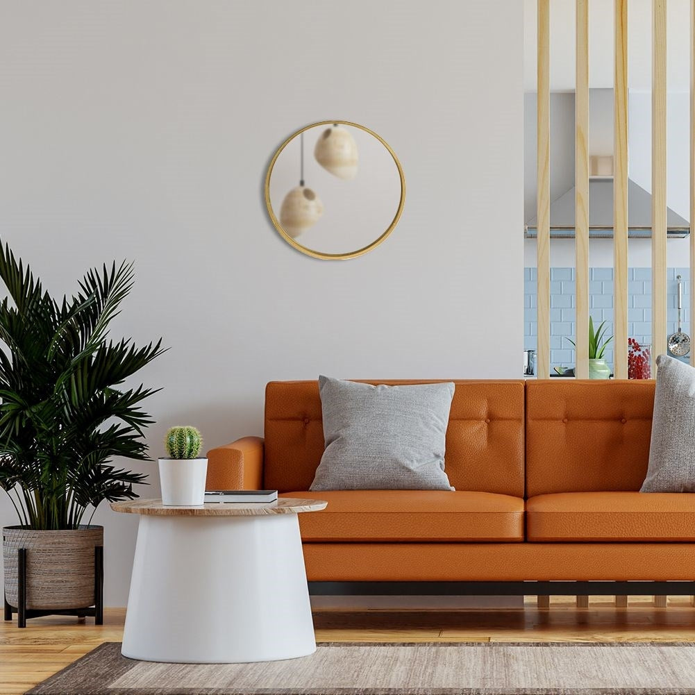 Elegant wall-hung mirror in gold wooden frame