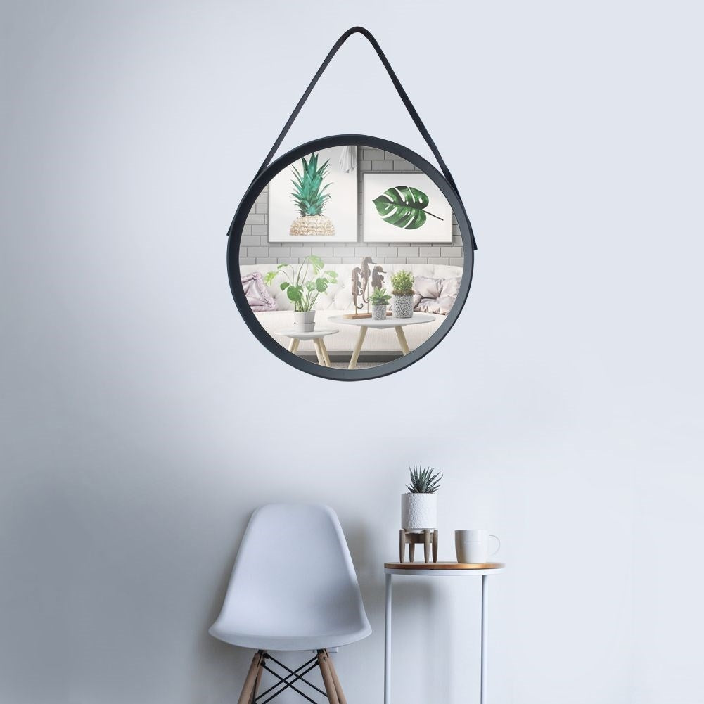 Elegant wall mirror with black frame and ribbon for any room
