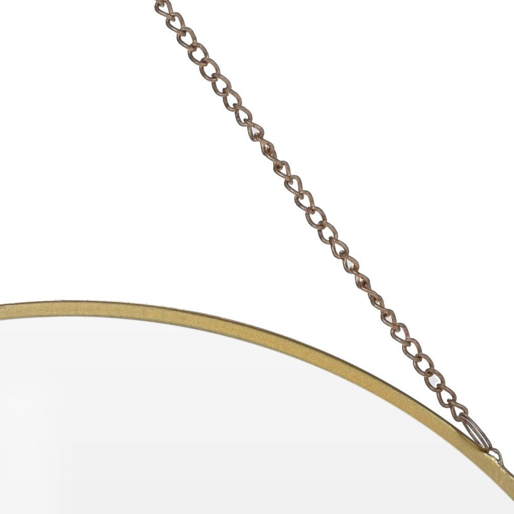 Elegant wall mirror with golden frame and chain suspension