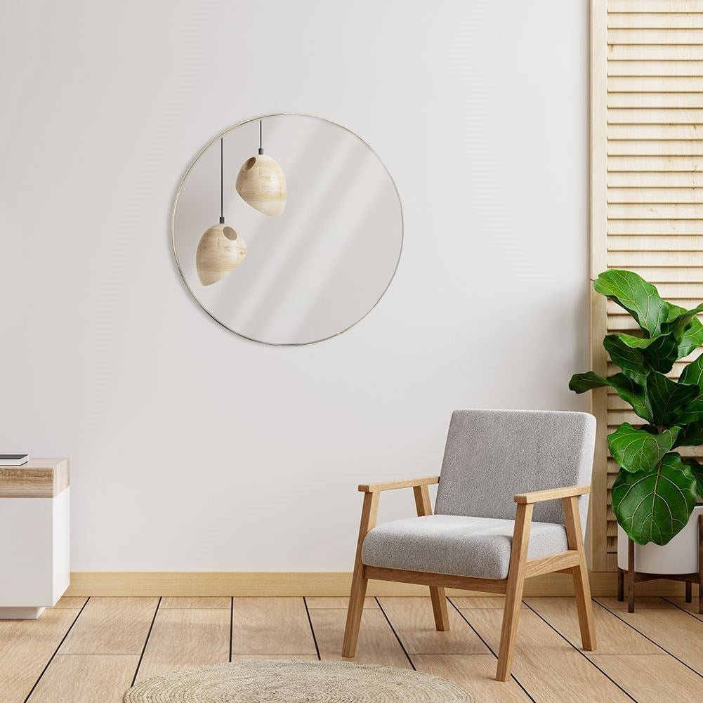 Elegant wall mirror with gold metal frame for any room