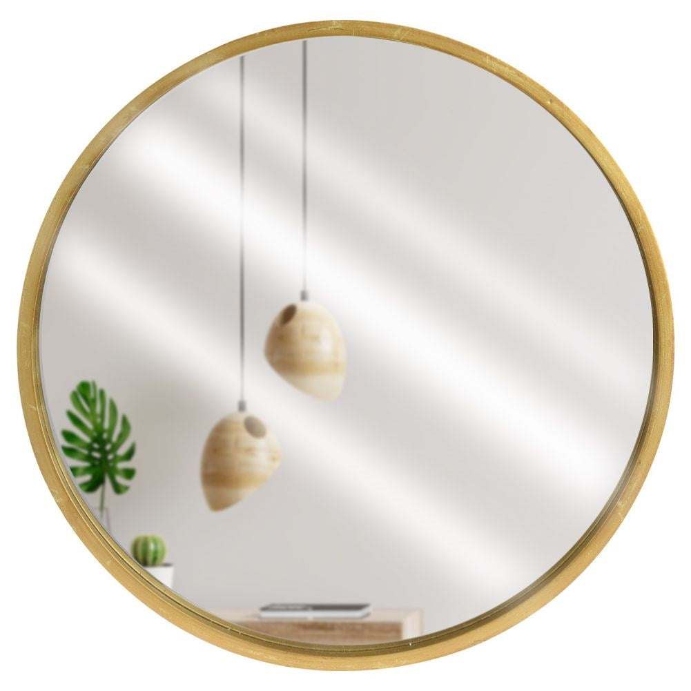 Elegant wall mirror with gold wooden frame for luxurious interior design