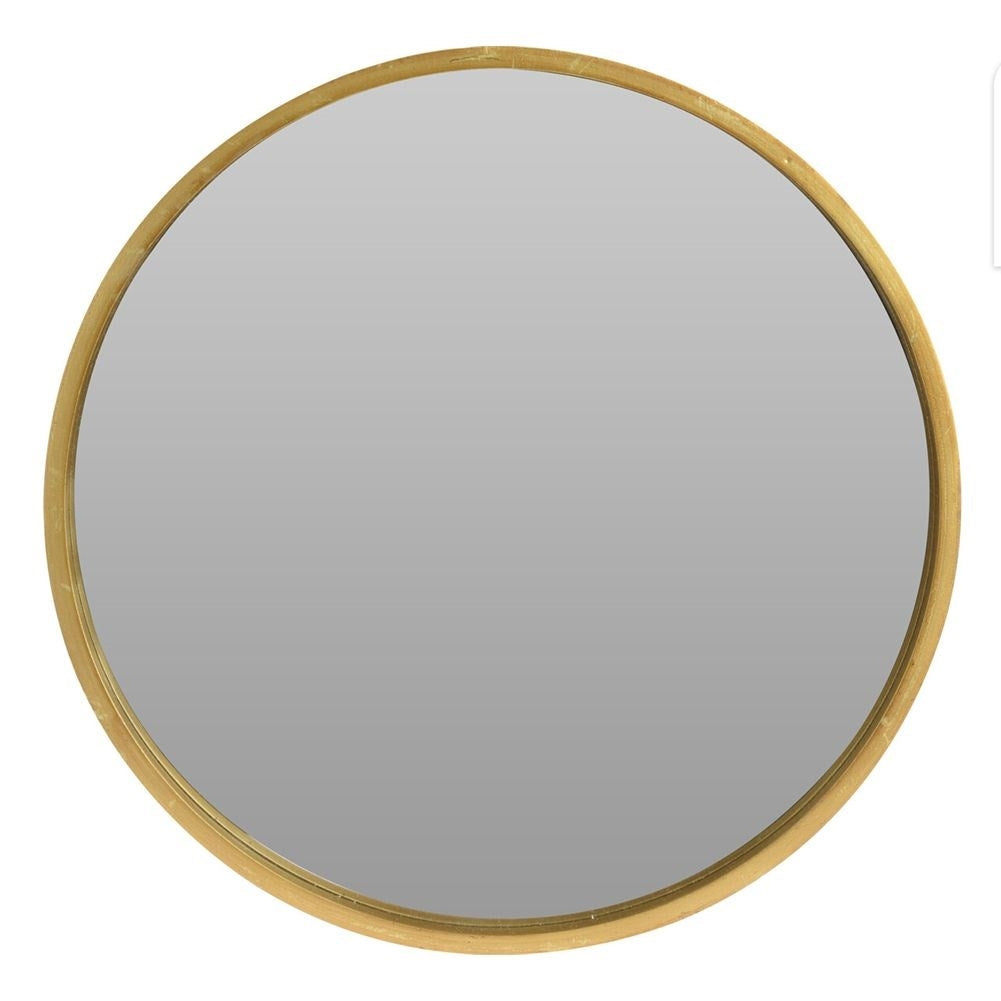 Elegant wall mirror with gold wooden frame for luxurious interior design