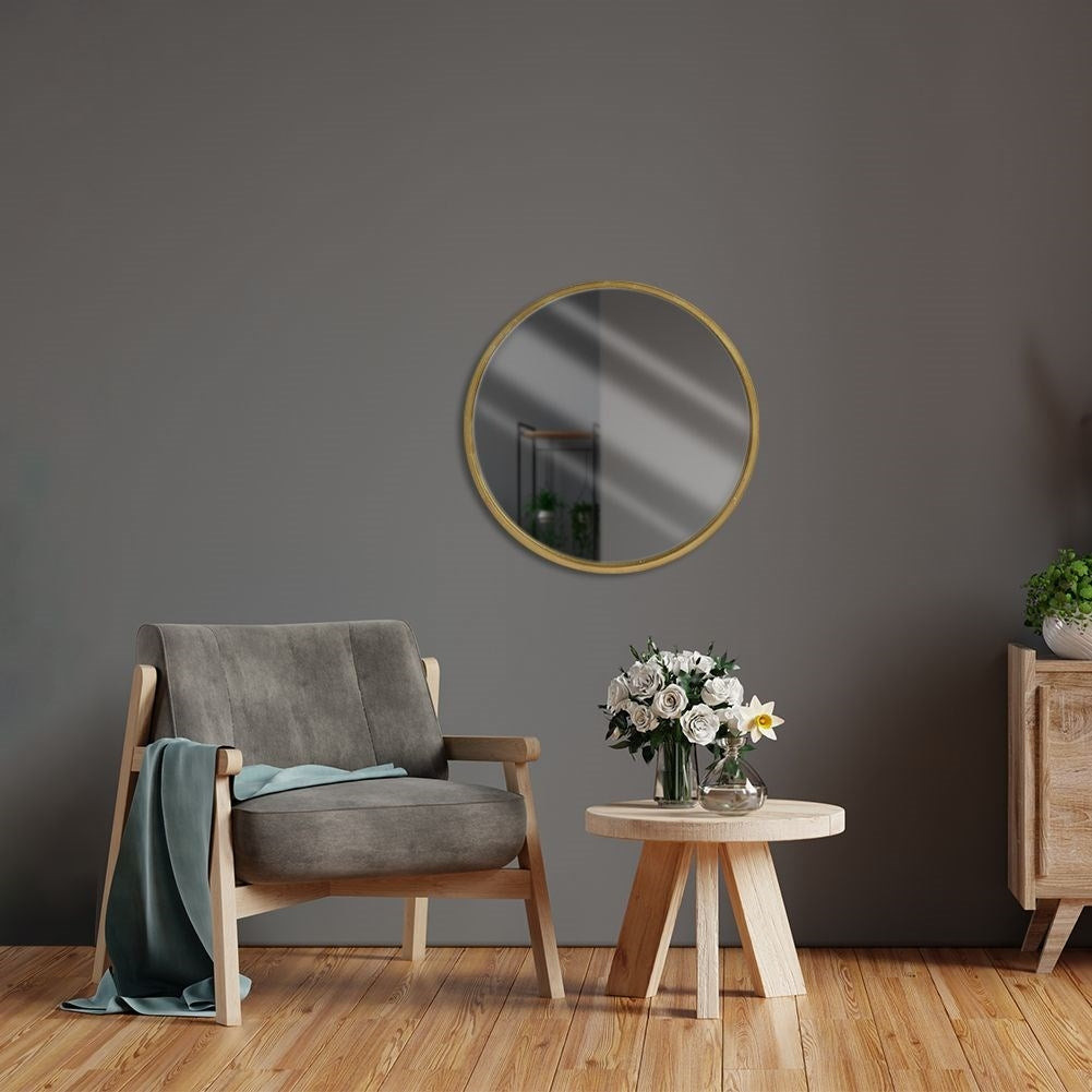 Elegant wall mirror with gold wooden frame for luxurious interior design