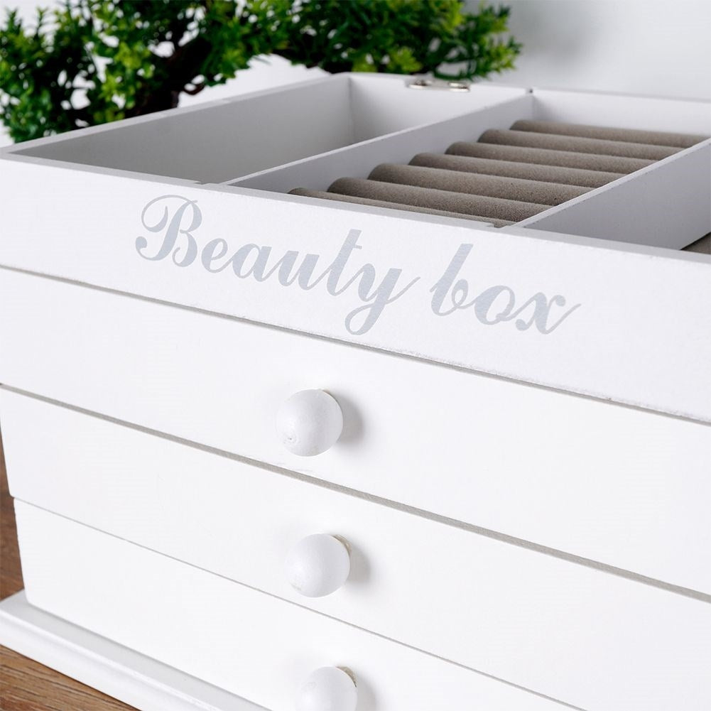 Elegant white jewelry box with glass lid and three drawers