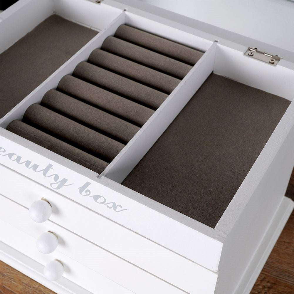 Elegant white jewelry box with glass lid and three drawers