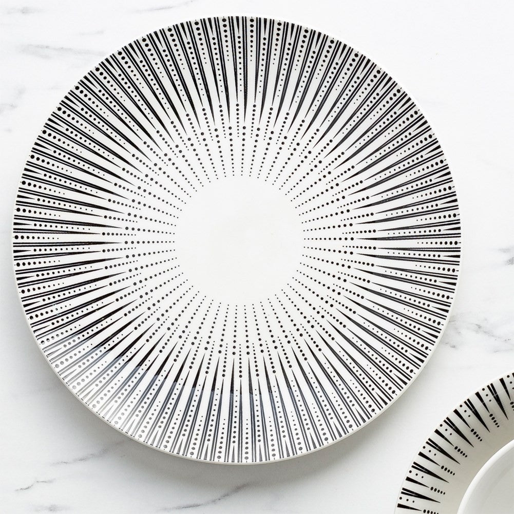 Elegant white porcelain tableware with sophisticated black decor
