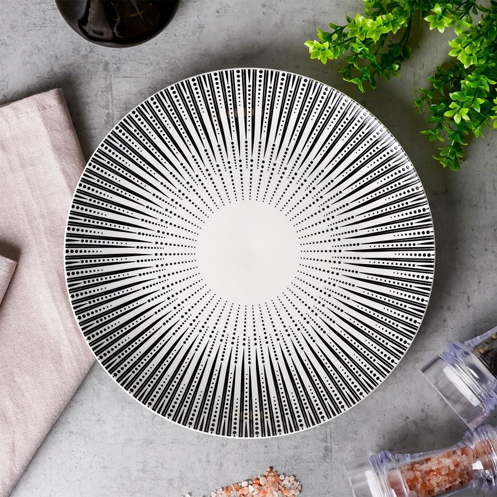 Elegant white porcelain tableware with sophisticated black decor