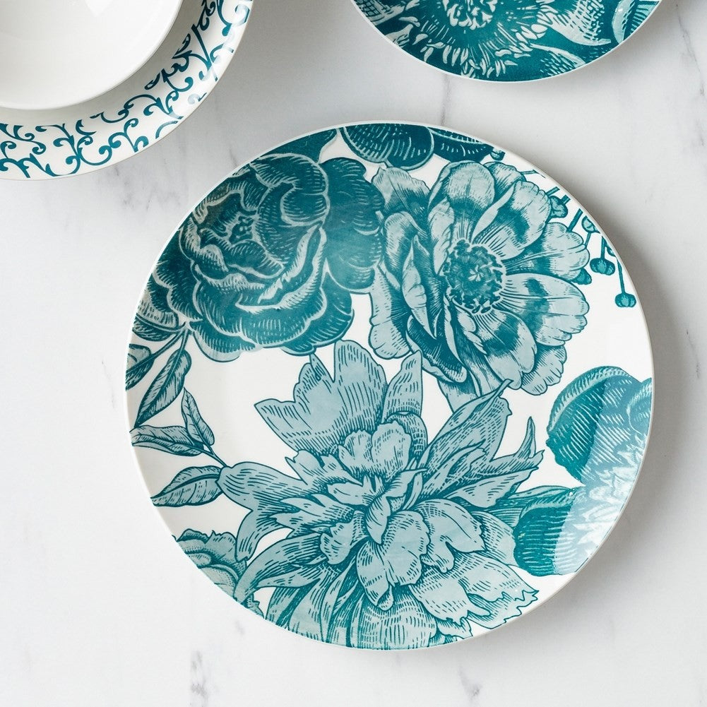 Elegant white porcelain vases with turquoise floral design