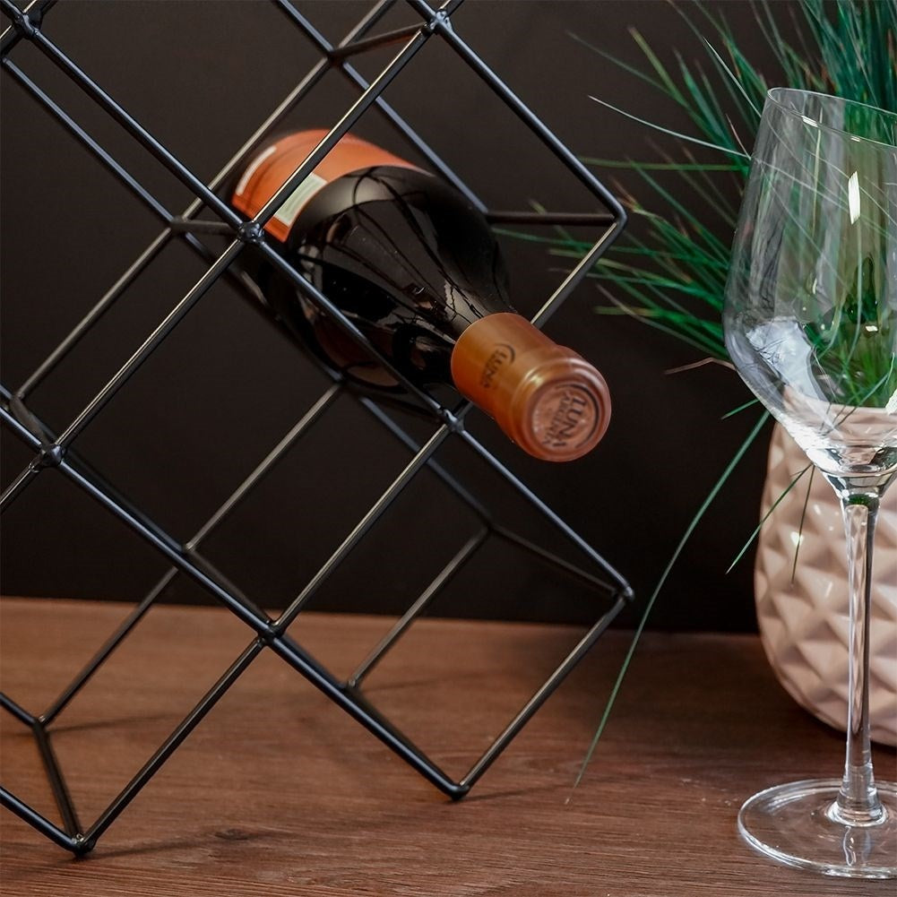 Elegant wine bottle rack in black metal for up to 8 bottles