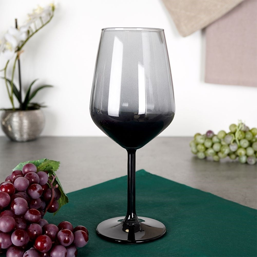 Elegant wine glass in high-quality glass with gold rim