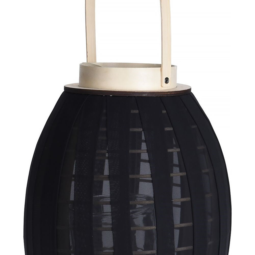 Elegant wooden lantern with black fabric and glass inlay
