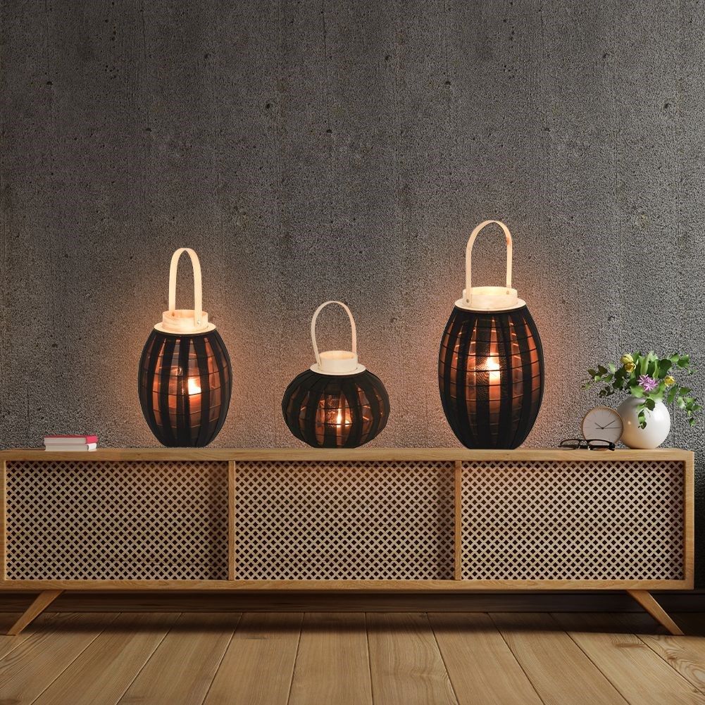 Elegant wooden lantern with black fabric and glass inlay