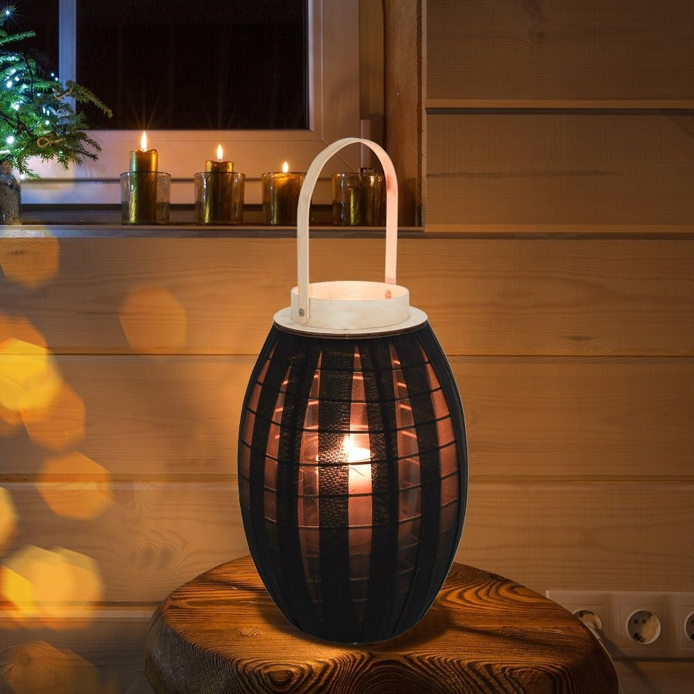 Elegant wooden lantern with black fabric and glass inlay