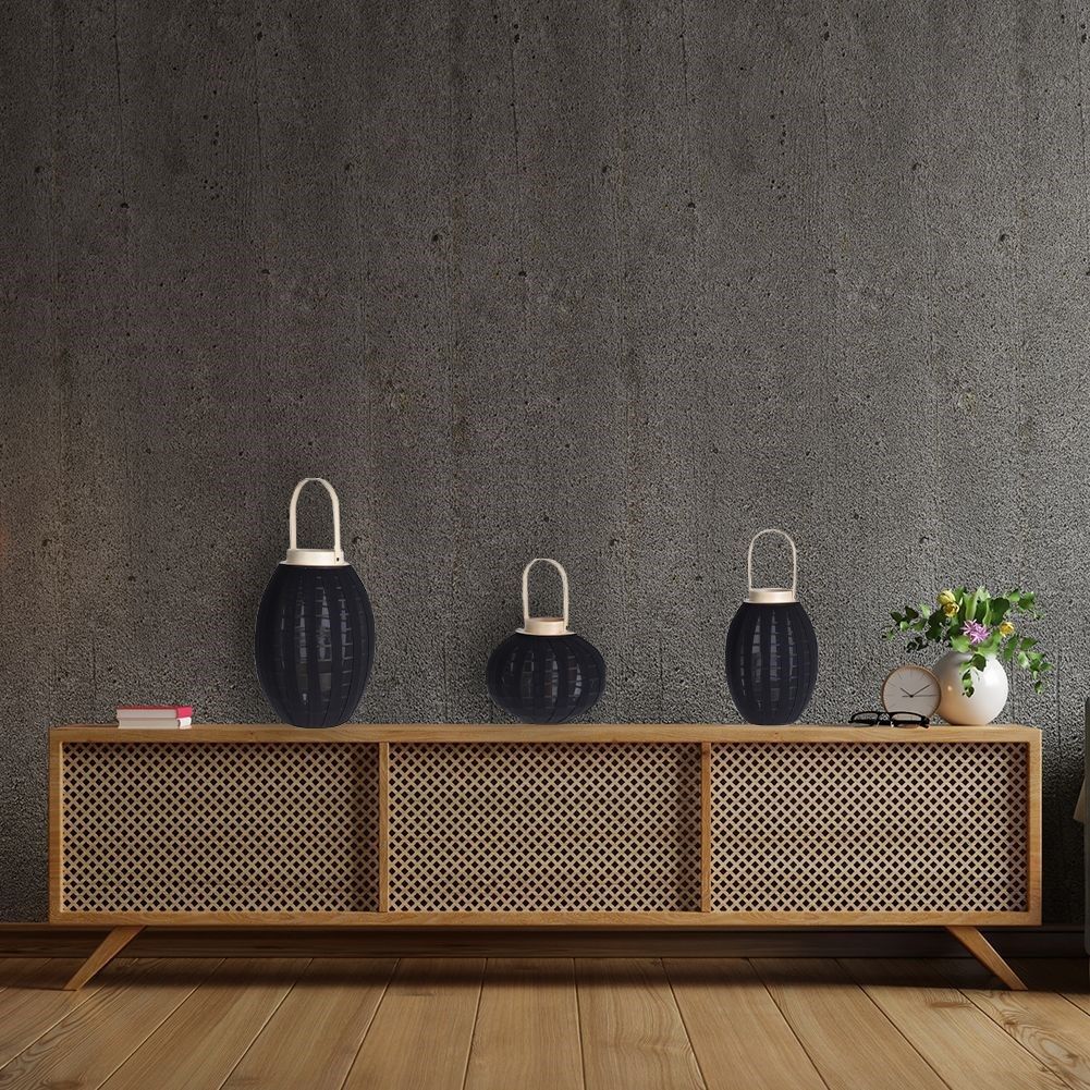 Elegant wooden lantern with black fabric and glass inlay