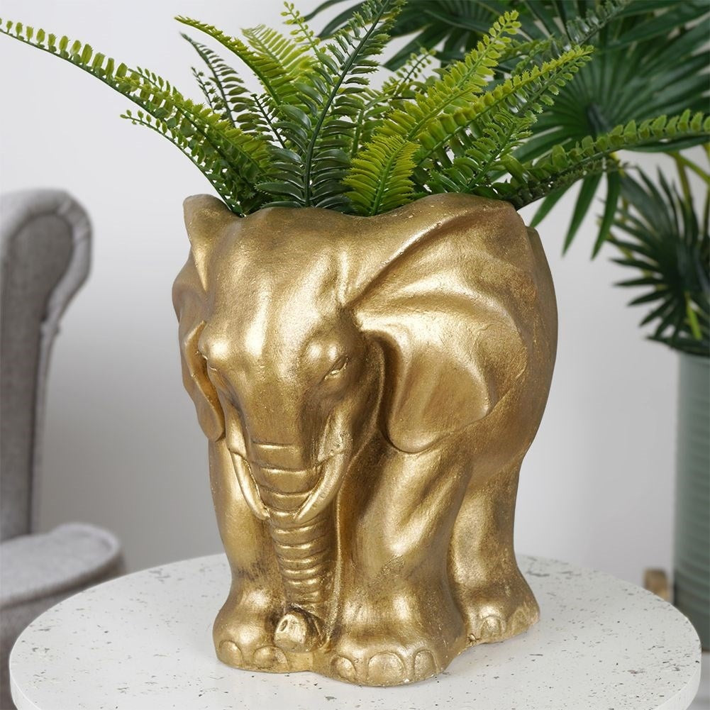 Elephant-shaped flower pot in cement, elegant gold shade