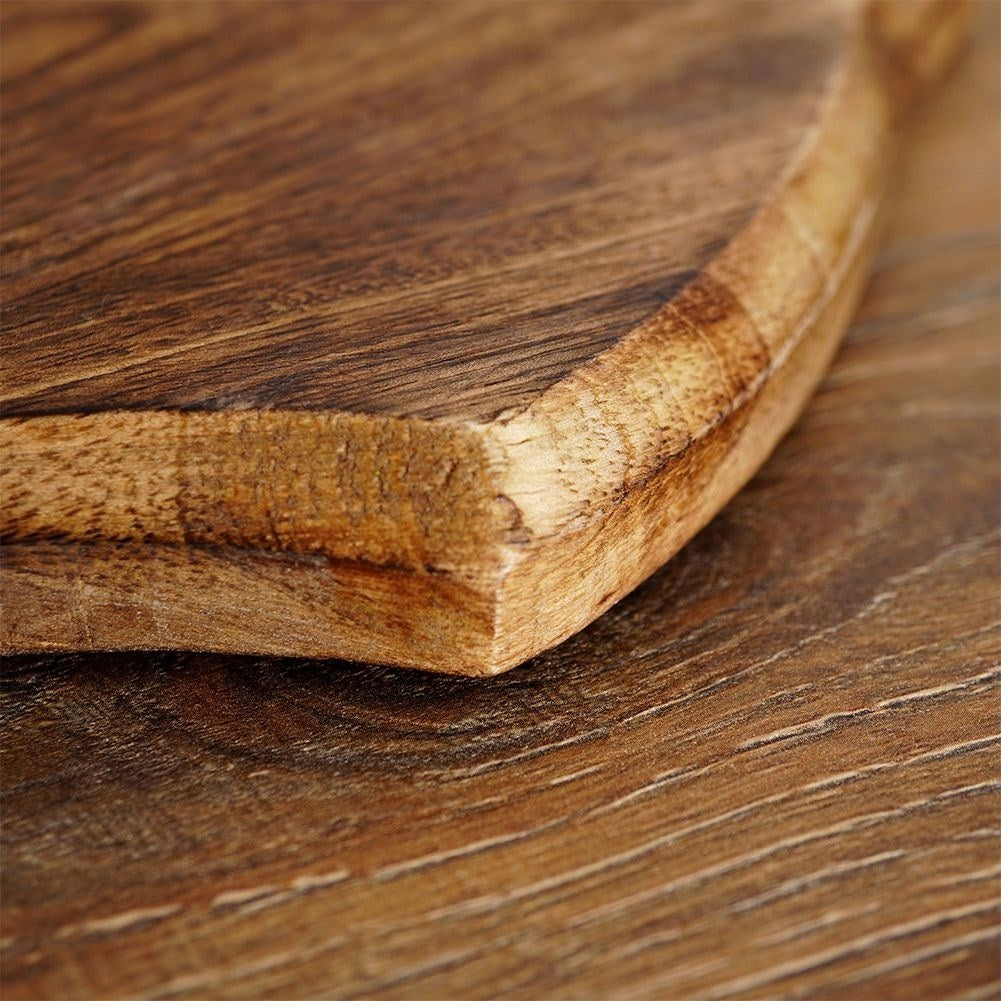 Exotic mango wood kitchen board - unique aged look and shape