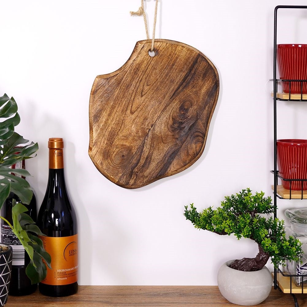 Exotic mango wood kitchen board - unique aged look and shape
