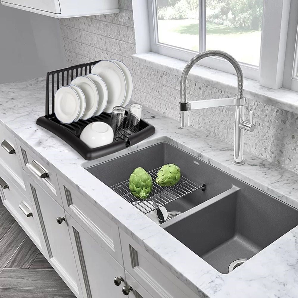 Extendable black dish rack with space for plates and glasses