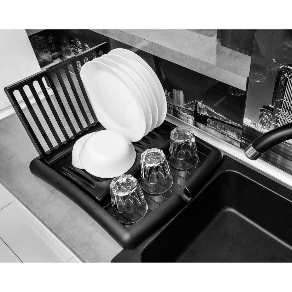 Extendable black dish rack with space for plates and glasses