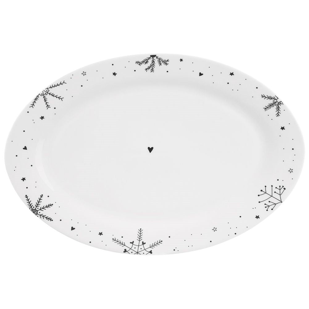 Festive oval plate in white porcelain with snowflake motif