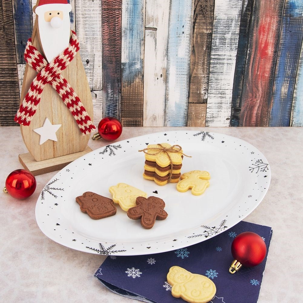 Festive oval plate in white porcelain with snowflake motif