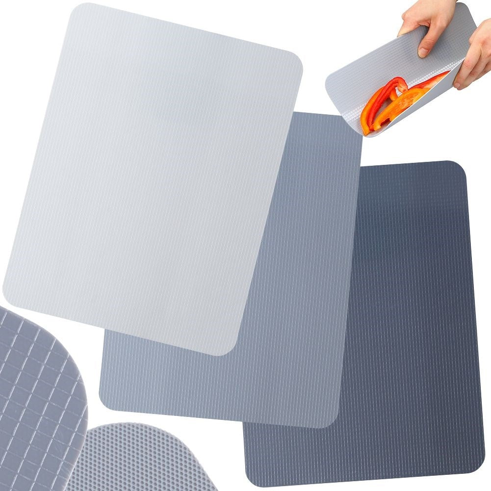 Flexible cutting boards in sets of three for easy handling
