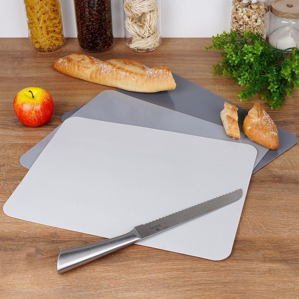 Flexible cutting boards in sets of three for easy handling