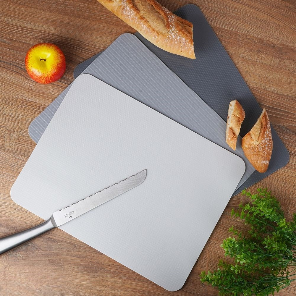 Flexible cutting boards in sets of three for easy handling
