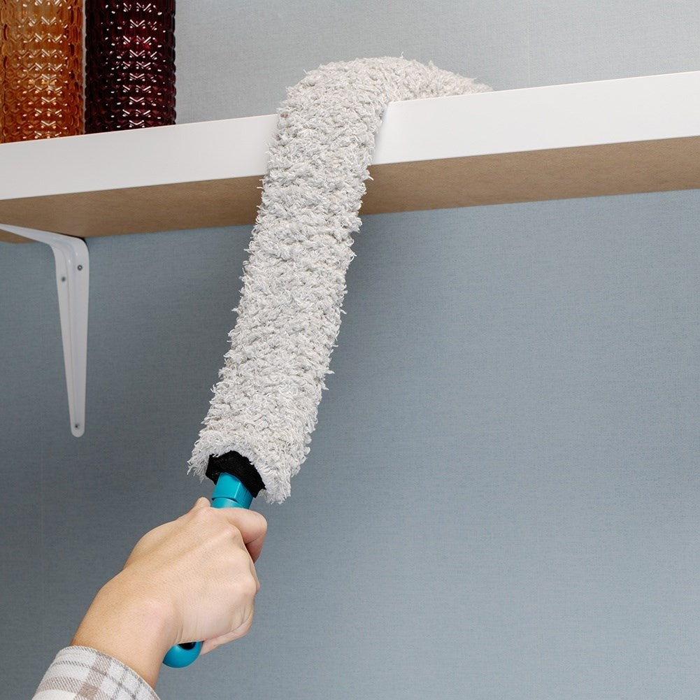 Flexible element brush with antistatic bristles for easy cleaning