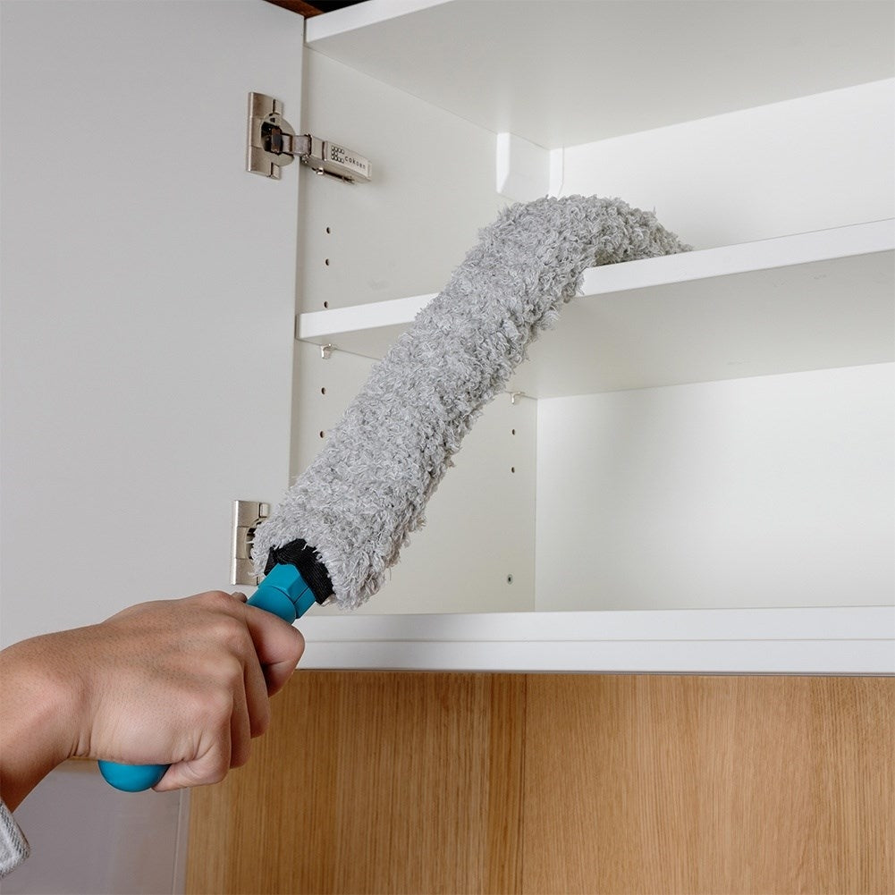 Flexible element brush with antistatic bristles for easy cleaning