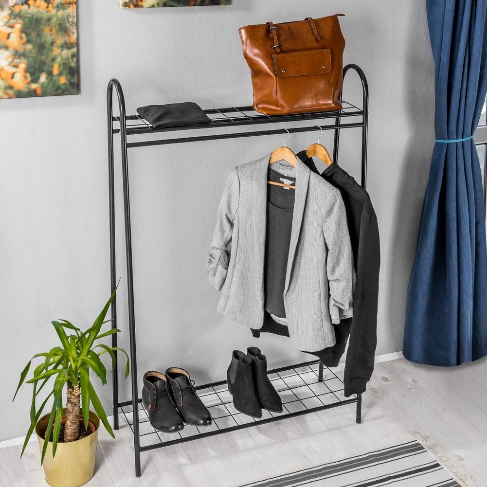 Floor-standing clothes hanger with shelves
