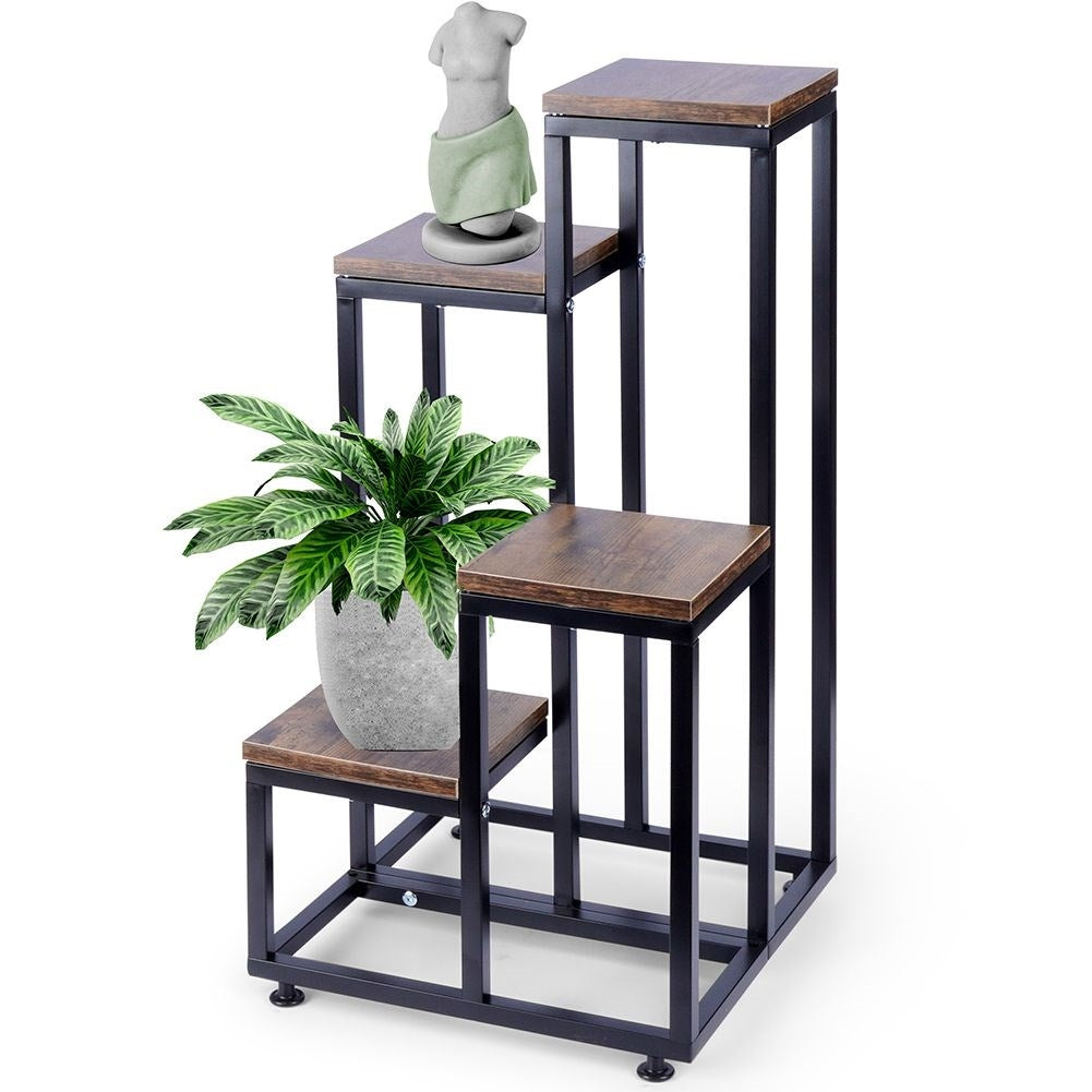 Flower arrangement in metal with four levels for plants and decoration