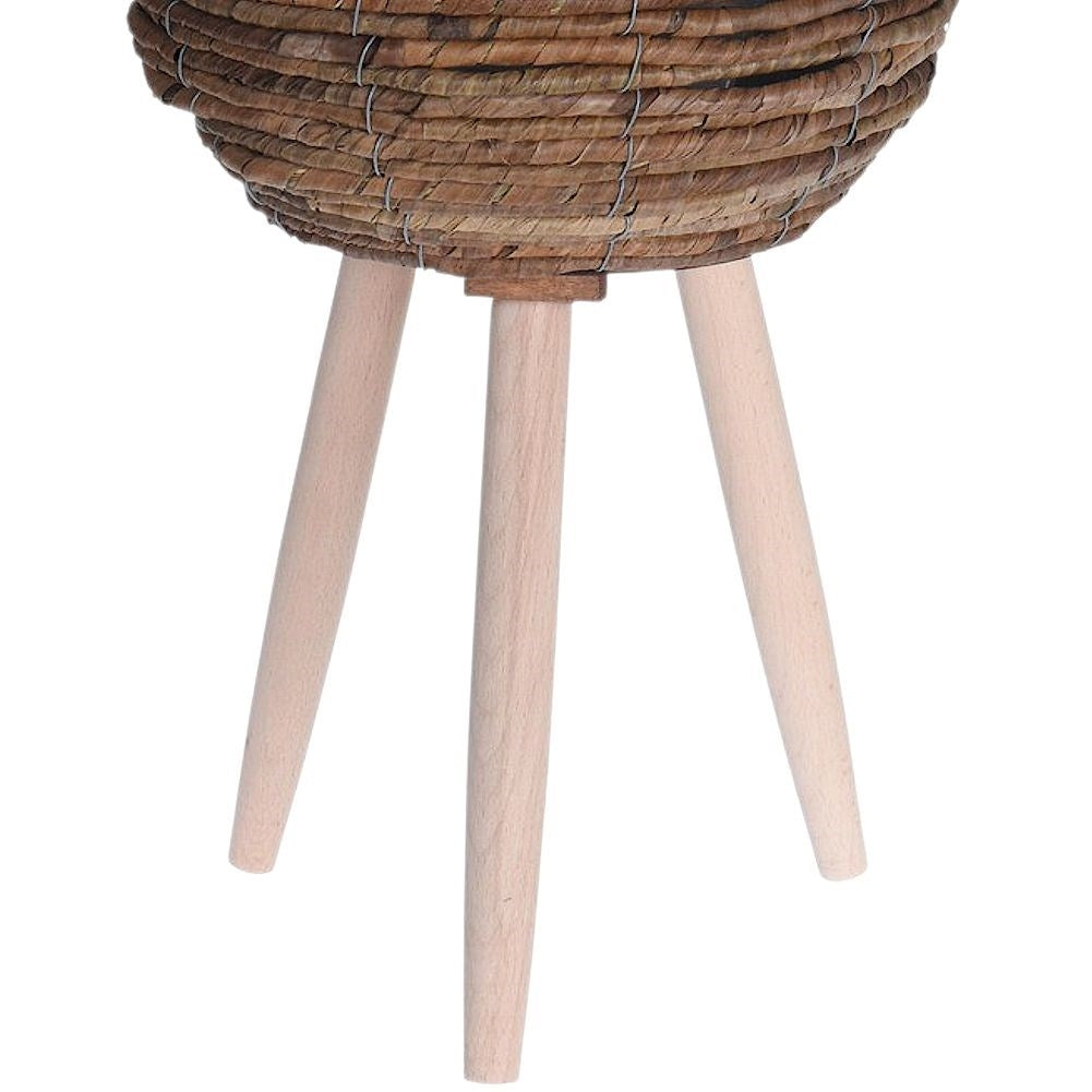 Flower pot with wooden legs and natural materials