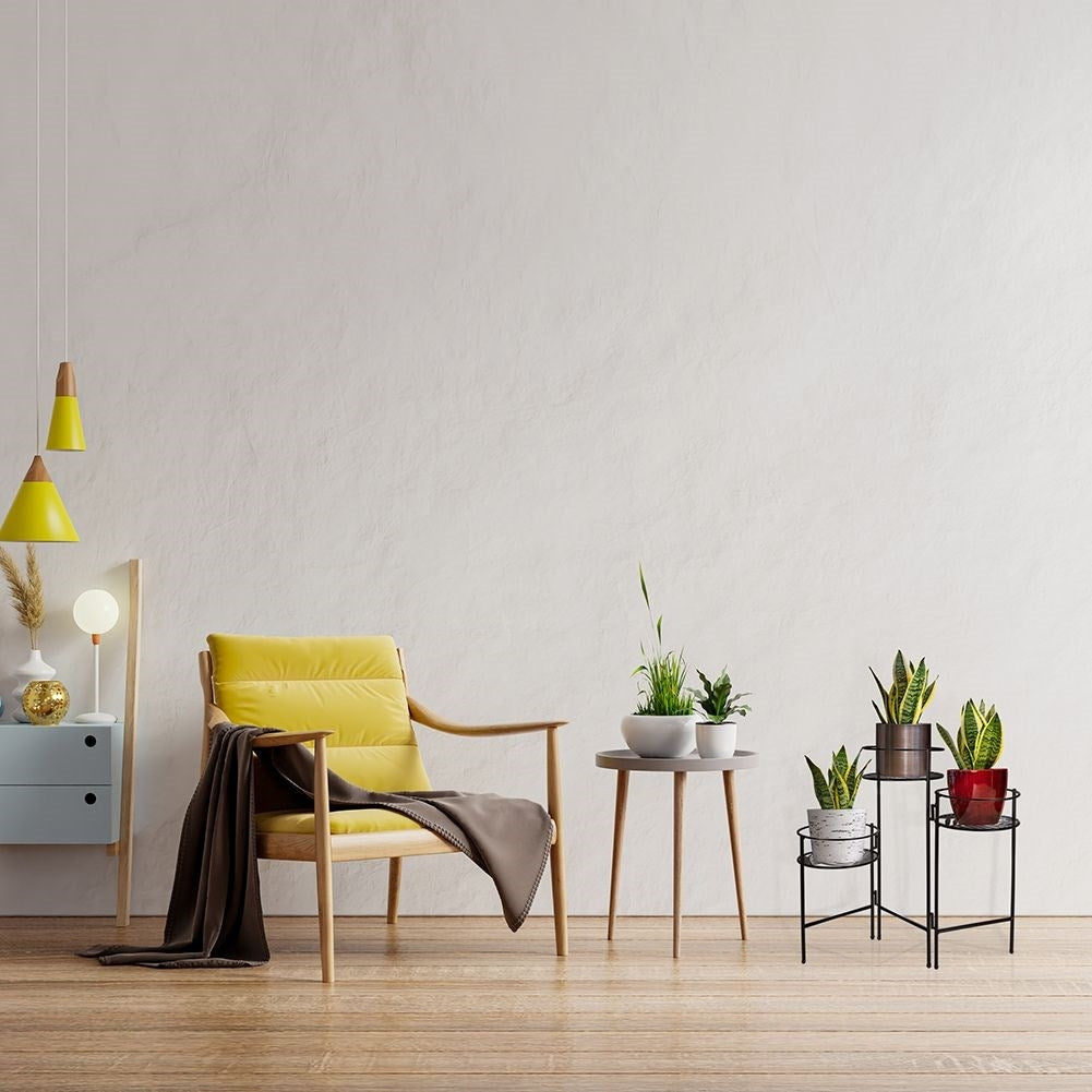 Flower stand in black metal, industrial loft style, three levels