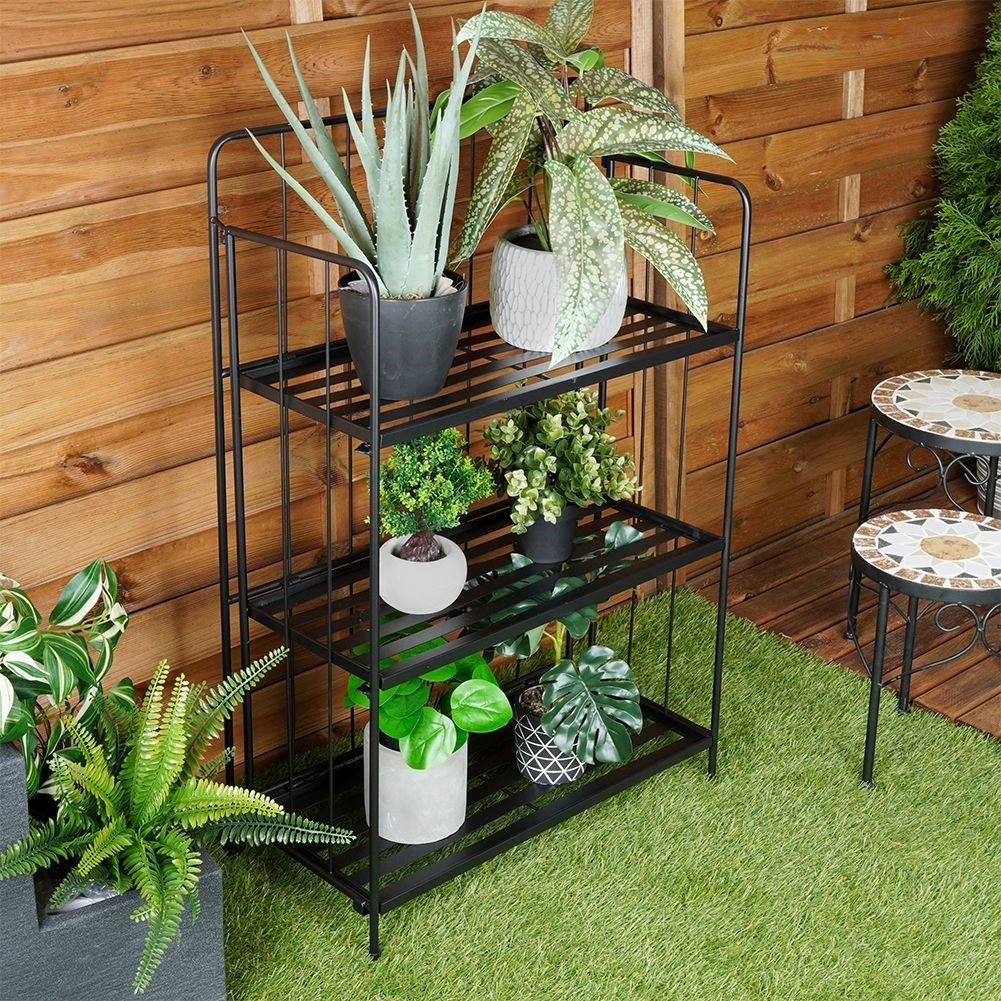Flower stand in black metal with three levels for flower pots